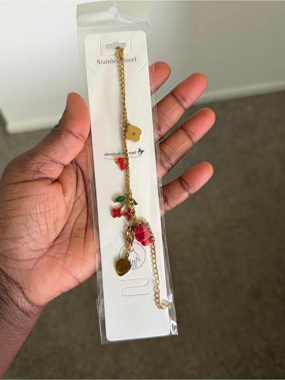 Stainless Steel Gold-Tone Charm Bracelet with Red Flower Accents